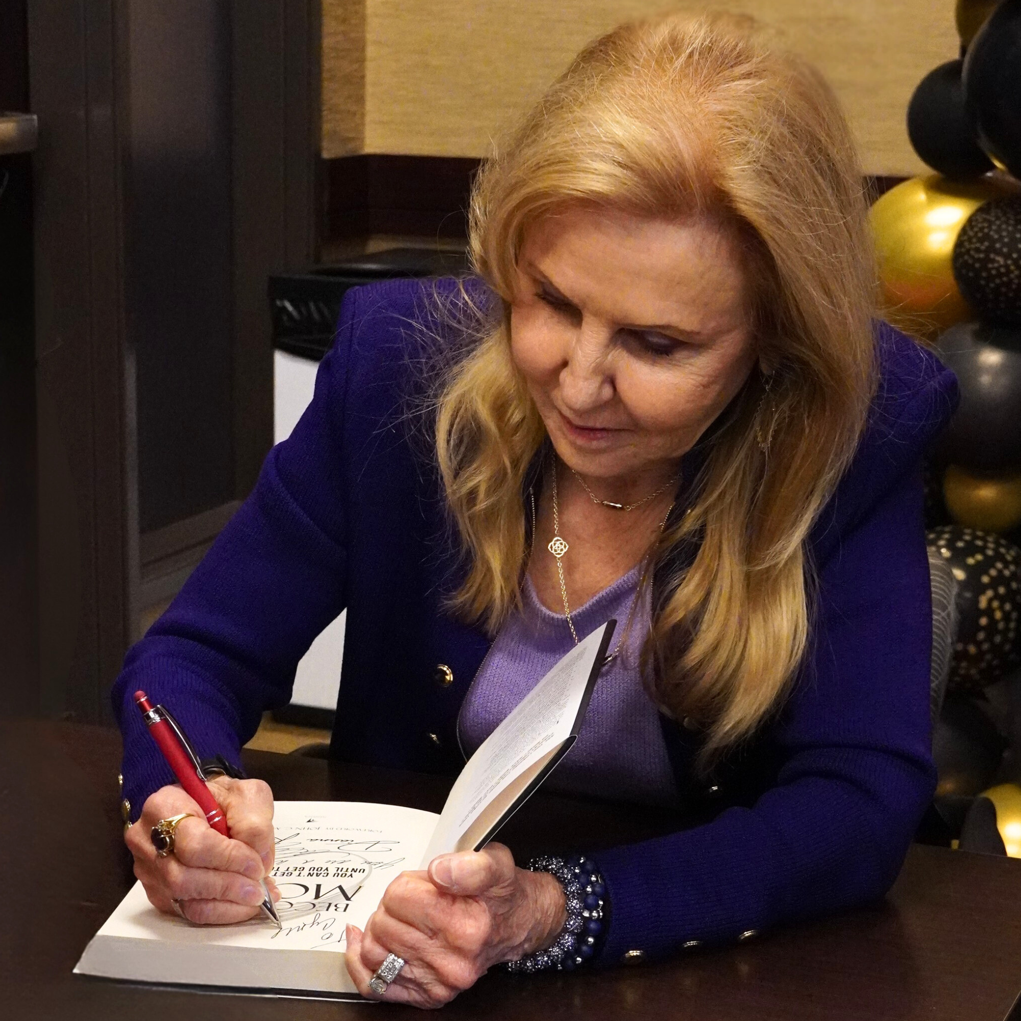 Dianna signing books